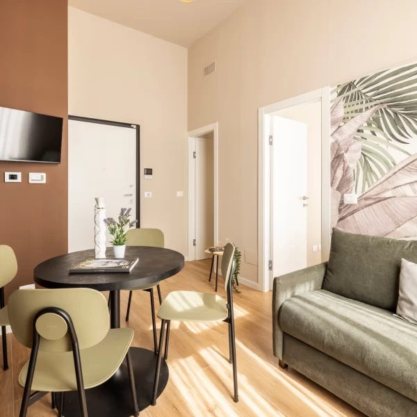 Appartamenti di lusso Torino, design italiano, quiet luxury nel centro storico. Boutique hotel A7 Suite Torino, residenza storica.